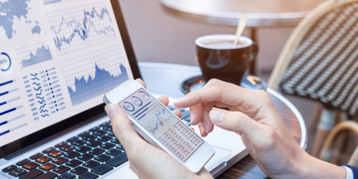 5 Reasons To Start Investing Early Smart Military Money - investing in stocks and analyzing stock performance on multiple devices