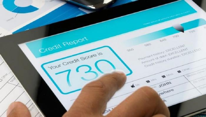 Tablet displaying a credit score website.