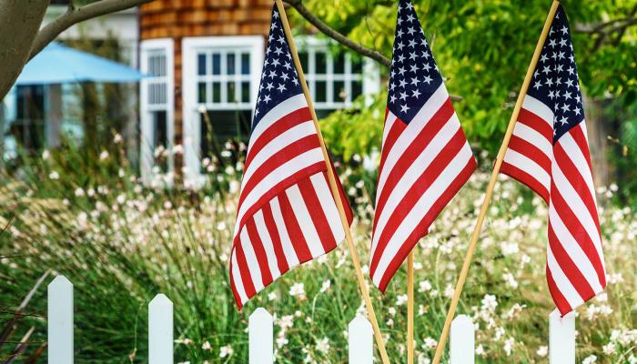 american flags outside of home