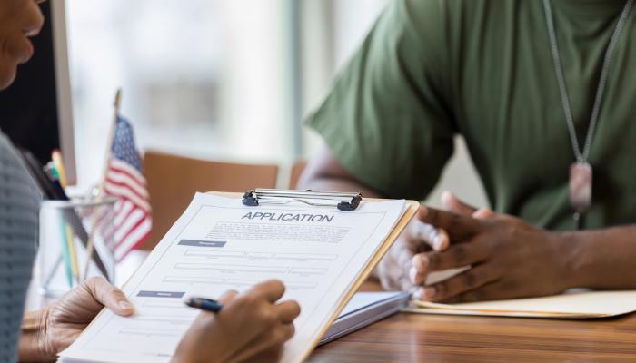 Soldier with a job application in hand.