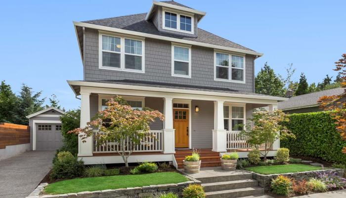 Two Story Gray House with Garage.
