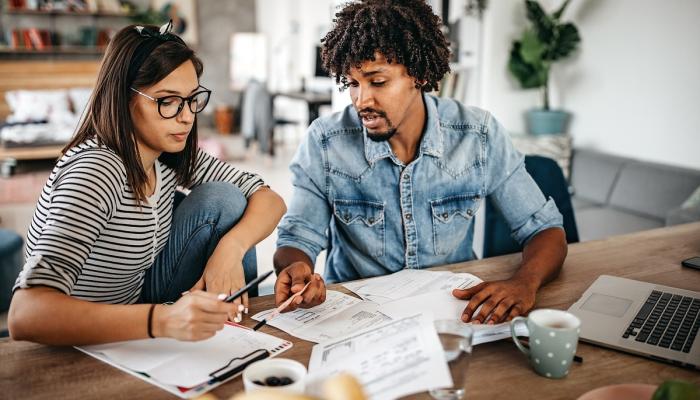 Couple making financial decisions.