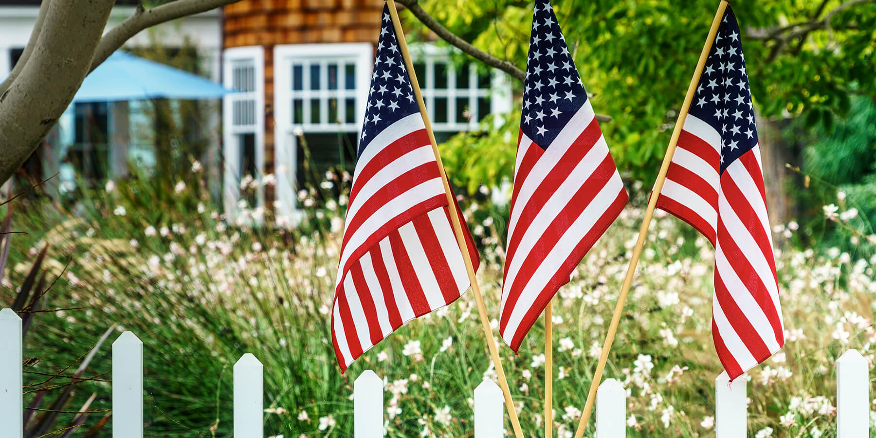 american flags outside of home