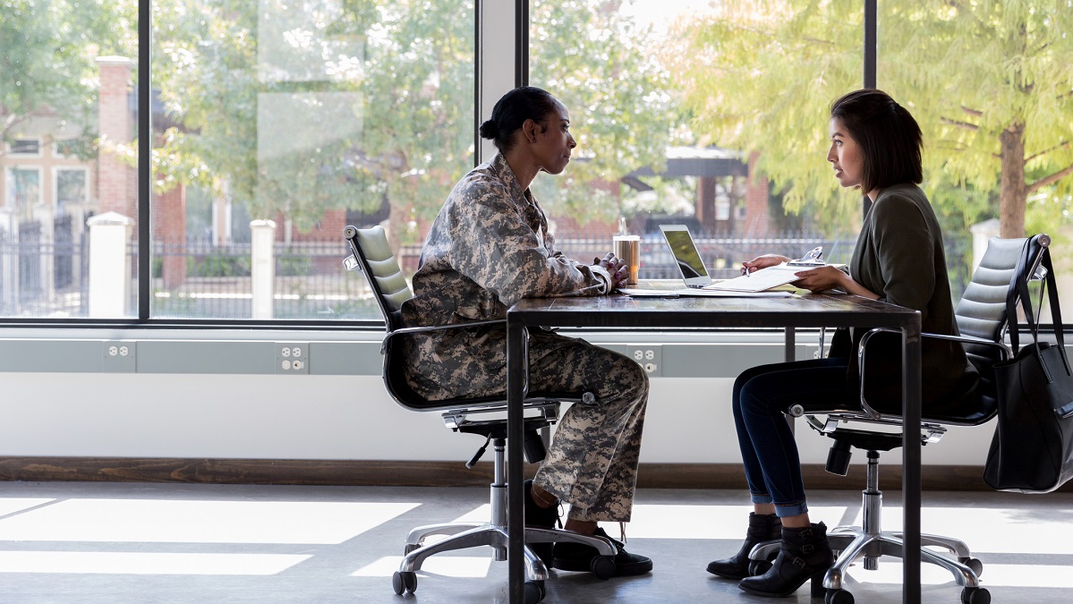 A Veteran and job interviewer discussing preference points.