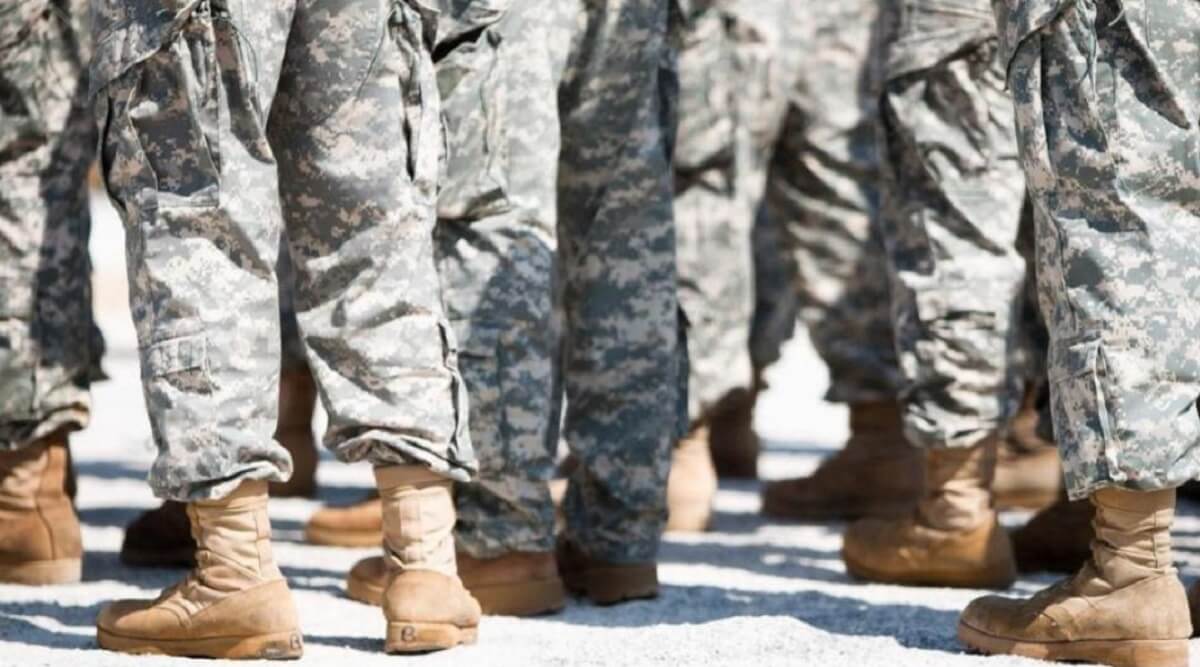 Bottom half of soldiers in military garb.