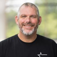 headshot image of Andy Miller