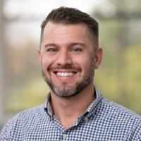 headshot image of Timothy Wuest