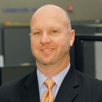 headshot image of Trevor Leeson