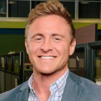 headshot image of Evan Capowski