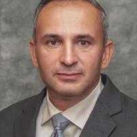 headshot image of Andre Machado