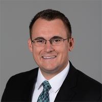 headshot image of Neil Hansen