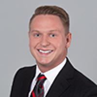 headshot image of Zach Schmitt