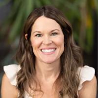 headshot image of Maggie Schuh