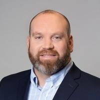 headshot image of Joel Smith