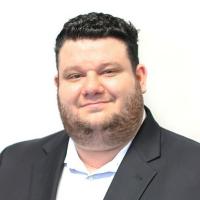 headshot image of Zack Schwartz