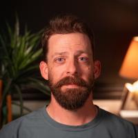 headshot image of Kyle Bass