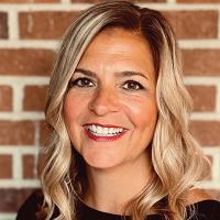 headshot image of Gina Hillesheim