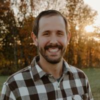 headshot image of Kenny Scheer