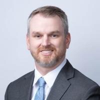 headshot image of Andrew Struttmann
