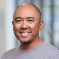 headshot image of Mickey Mendoza