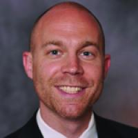 headshot image of James E. Walrod