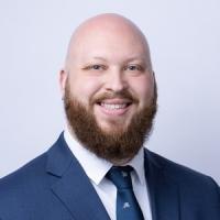 headshot image of Taylor Plummer