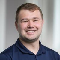 headshot image of Jake Albers