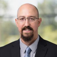 headshot image of Evan Campbell