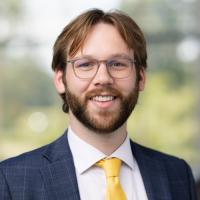 headshot image of Drew Tee