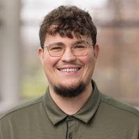 headshot image of Drew Dixon