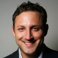 headshot image of Nick Hermann