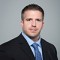 headshot image of Justin Harlan