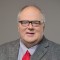headshot image of Jim Schrader