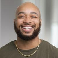 headshot image of Aaron Mallett