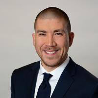 headshot image of Aaron Swanner