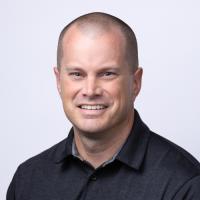 headshot image of Adam Wahlert