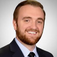 headshot image of Alan David