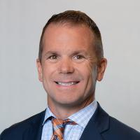 headshot image of Andrew Beckett