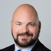 headshot image of Andy McCarthy