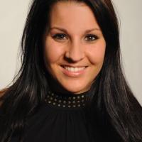 headshot image of Ashley Khederian