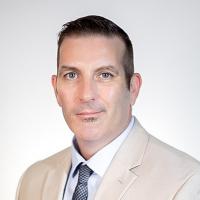 headshot image of Brandon Reed