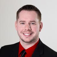 headshot image of Cam Moore