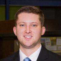 headshot image of Camron Hermann