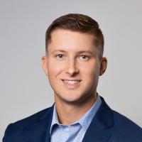 headshot image of Camron Hermann