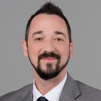 headshot image of Craig Patenaude