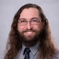 headshot image of Dan Campbell