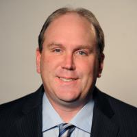 headshot image of Dave Buchner