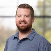 headshot image of Derek Russell