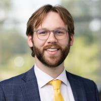 headshot image of Drew Tee