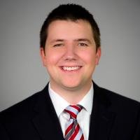 headshot image of Elliott Watkins